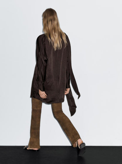 Long flowing blouse with tied neck