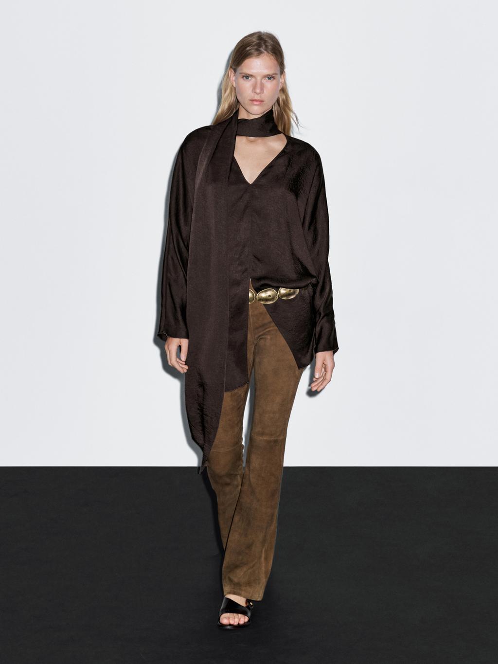 Long flowing blouse with tied neck