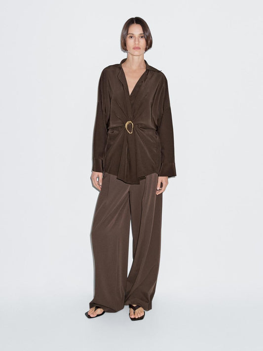 Long shirt with brooch detail