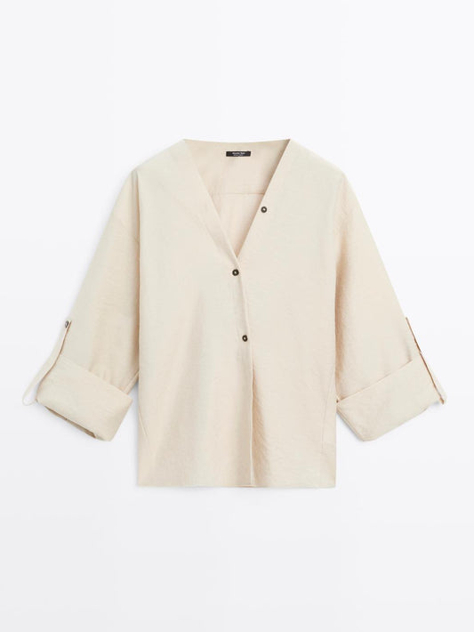 Shirt with rolled-up sleeves