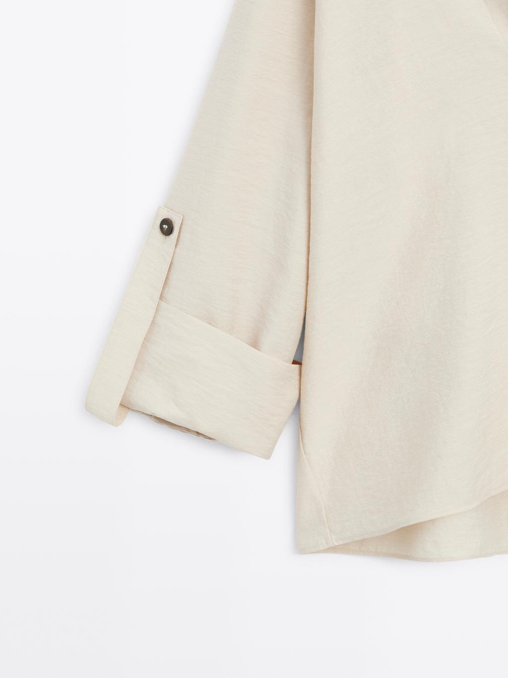 Shirt with rolled-up sleeves