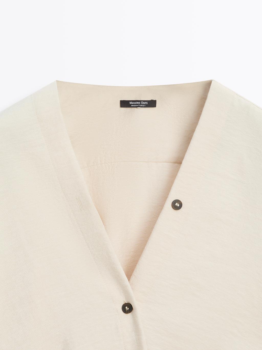 Shirt with rolled-up sleeves