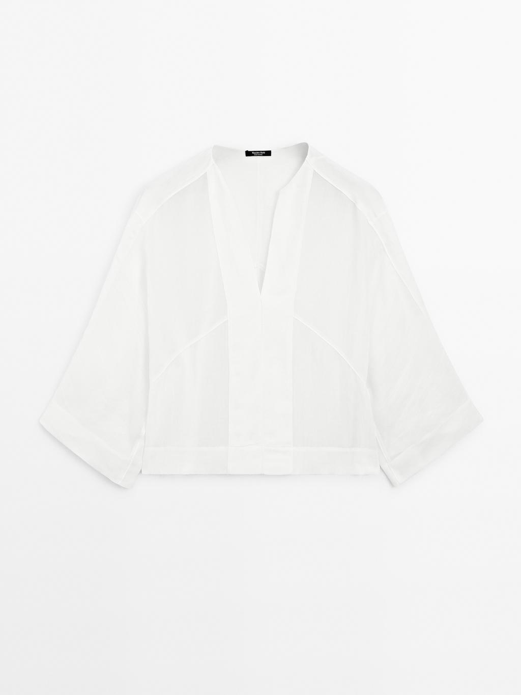 Flowing linen blend blouse with seam details