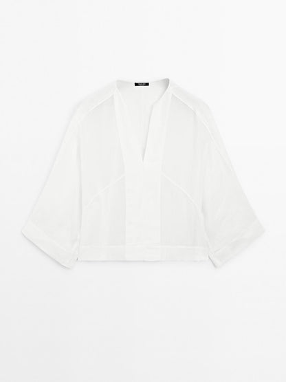 Flowing linen blend blouse with seam details