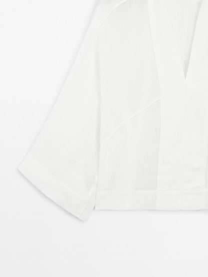 Flowing linen blend blouse with seam details