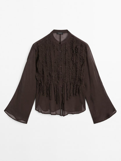 Flowing bib-front shirt with ruffles