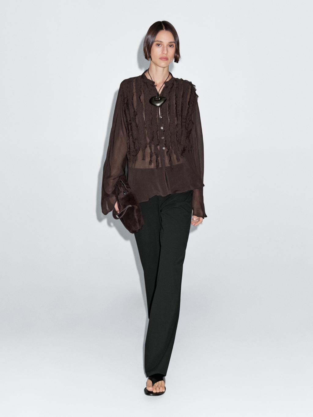 Flowing bib-front shirt with ruffles
