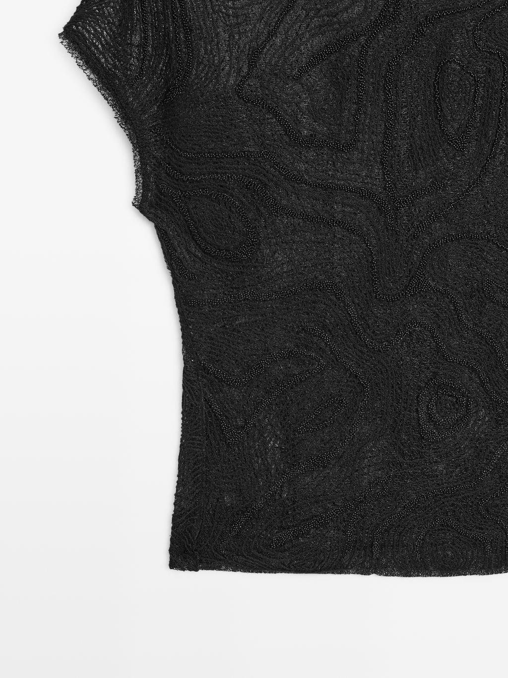 Semi-sheer embroidered top