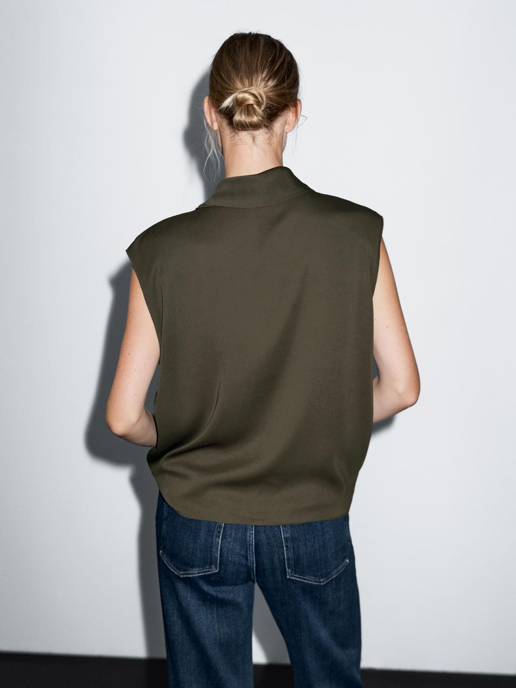 Flowing blouse with draped neck detail