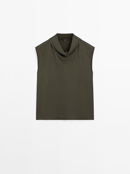 Flowing blouse with draped neck detail