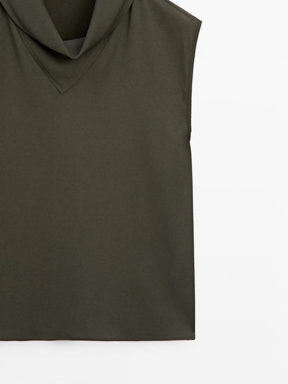 Flowing blouse with draped neck detail