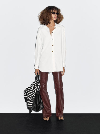 Poplin shirt with golden buttons