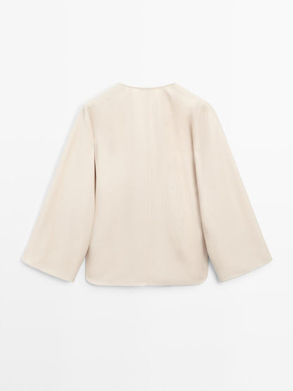 Flowing blouse with slit details