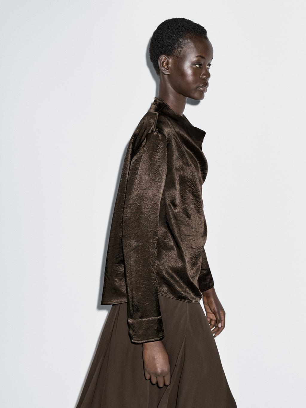 Flowing blouse with draped collar