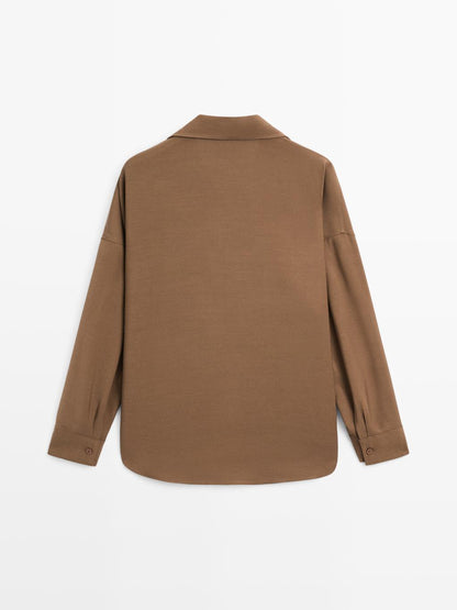 Flowing shirt with hidden buttons