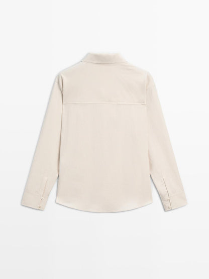 Flowing blouse with button detail