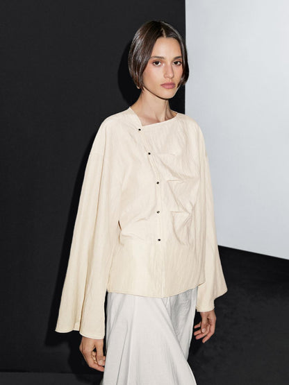 Long sleeve blouse with side button fastening