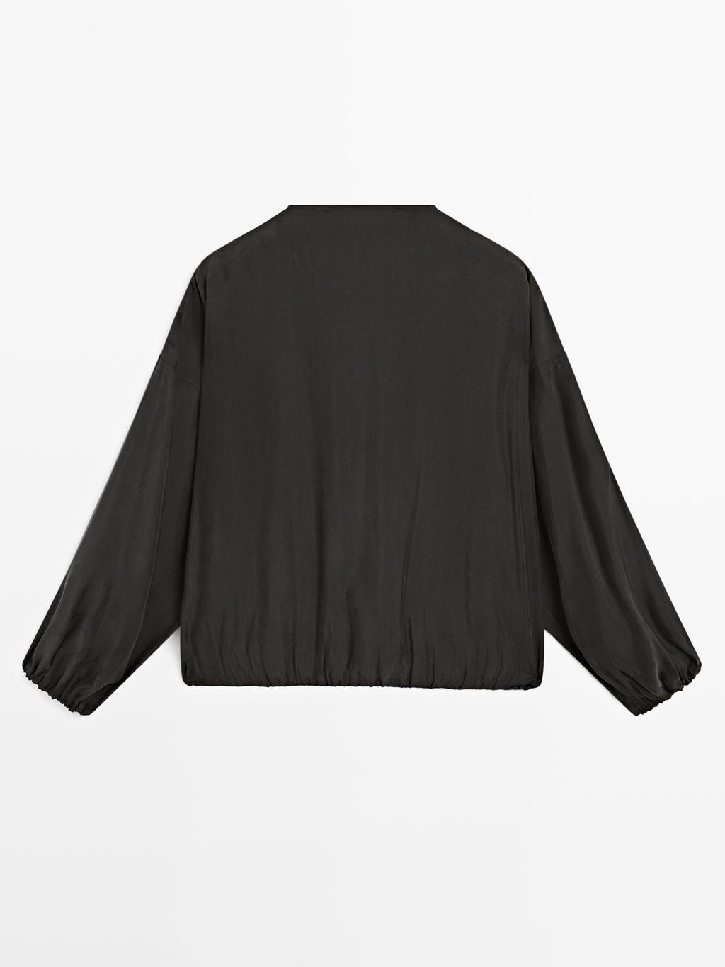 Flowing blouse with drawstring details