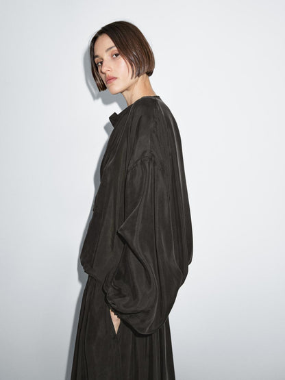 Flowing blouse with drawstring details