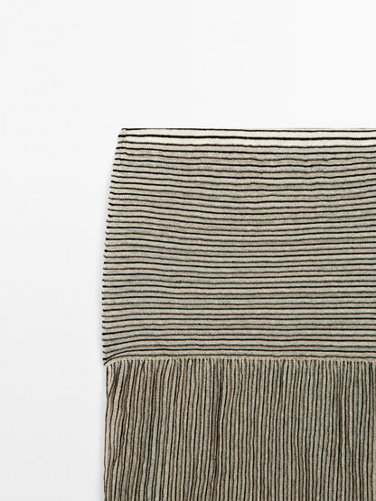 Long pleated skirt with flecked detail