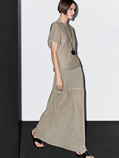 Long pleated skirt with flecked detail