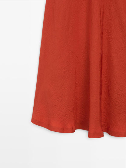 Long flared satin skirt