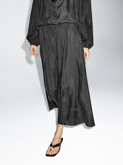 Flowing flared midi skirt