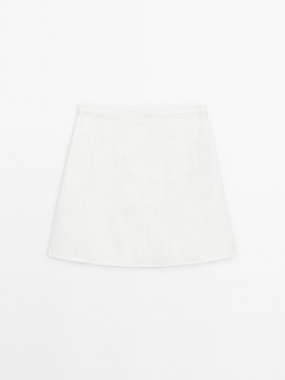Short denim skirt with seam details
