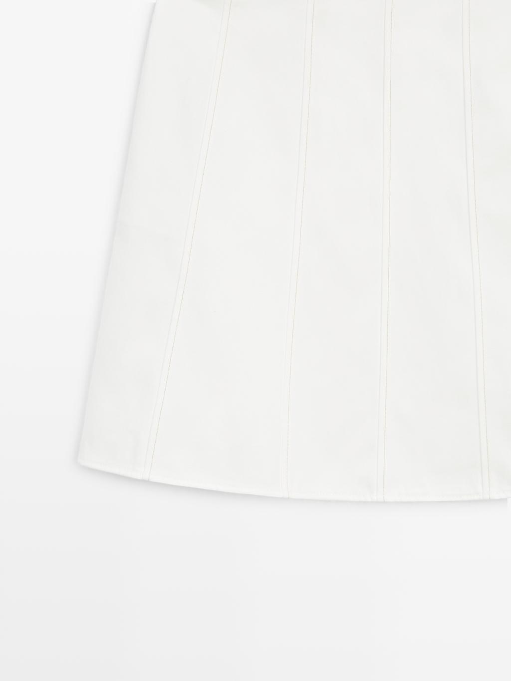 Short denim skirt with seam details