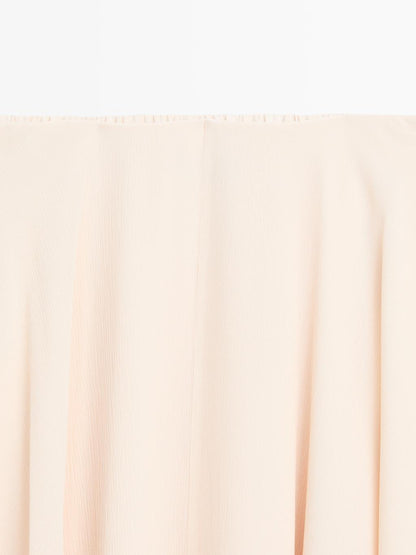 Flowing asymmetric midi skirt