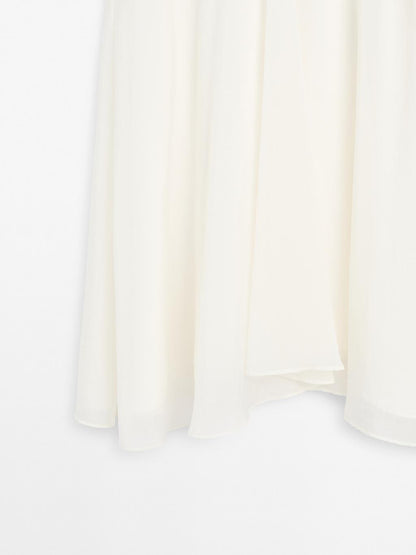 Midi skirt with yoke and flounce