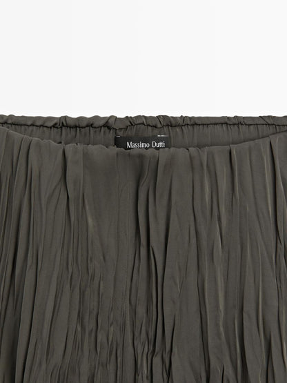 Long flowing pleated skirt