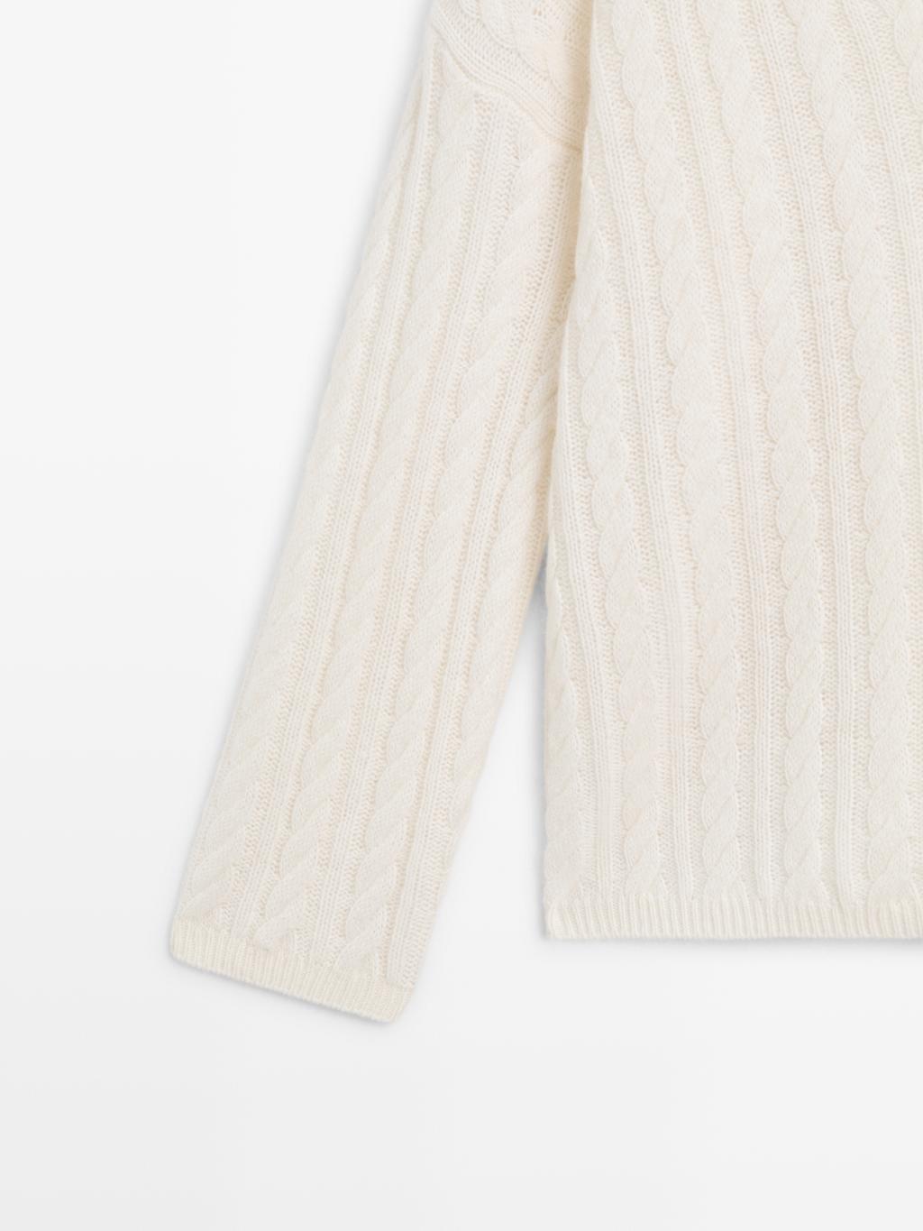 Cable-knit V-neck sweater