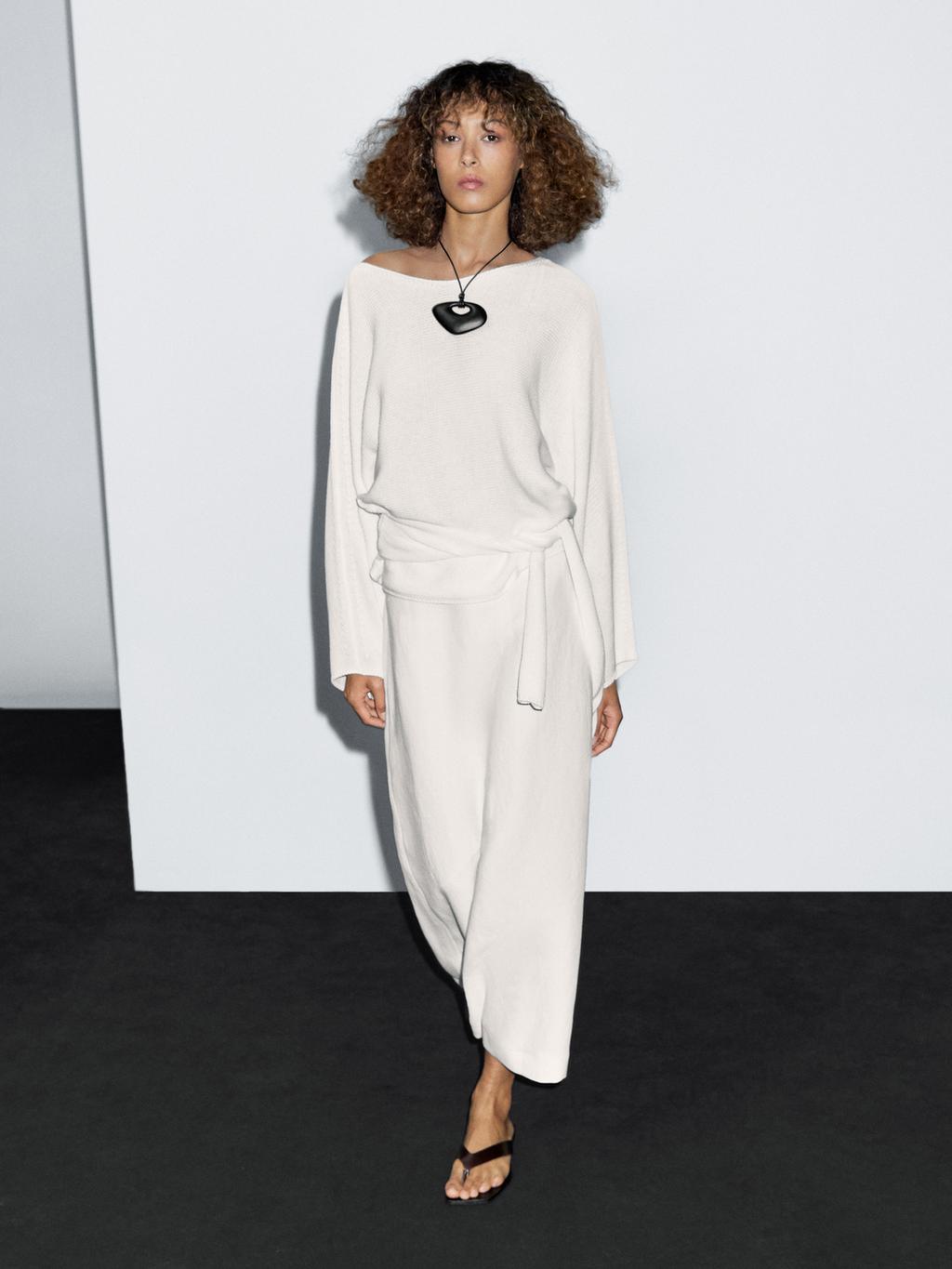 Knit sweater with bow detail