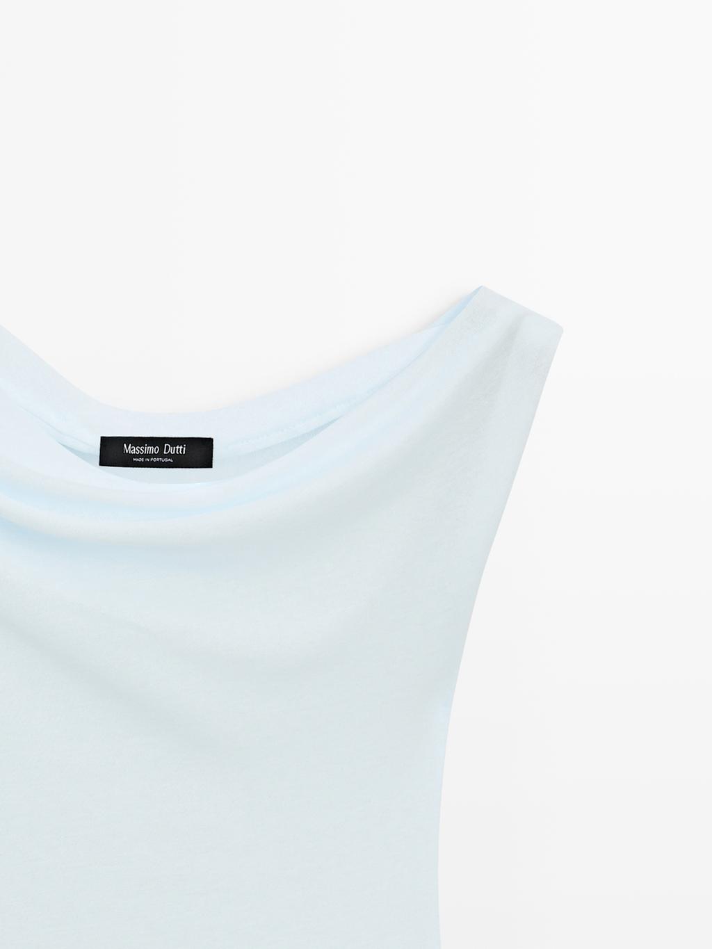 Sleeveless asymmetric top