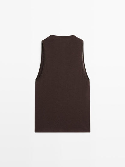 Sleeveless top with draped neckline