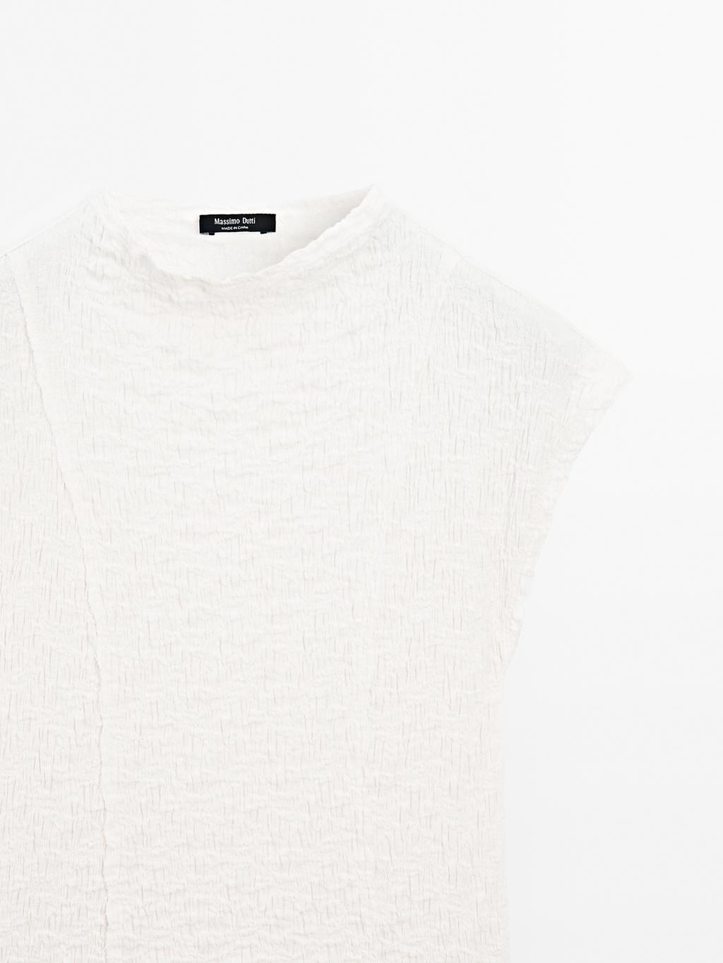 Sleeveless top with gathered detail