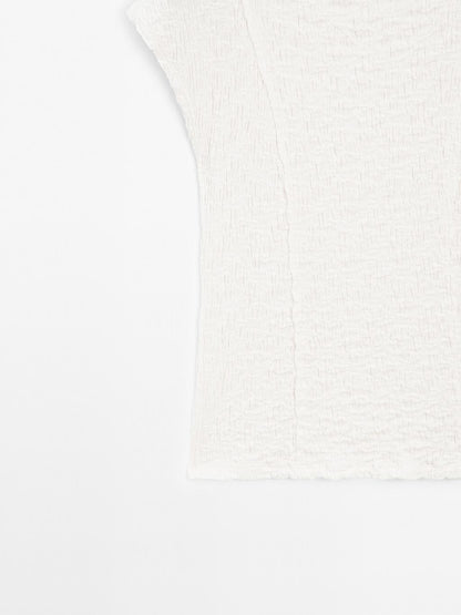 Sleeveless top with gathered detail