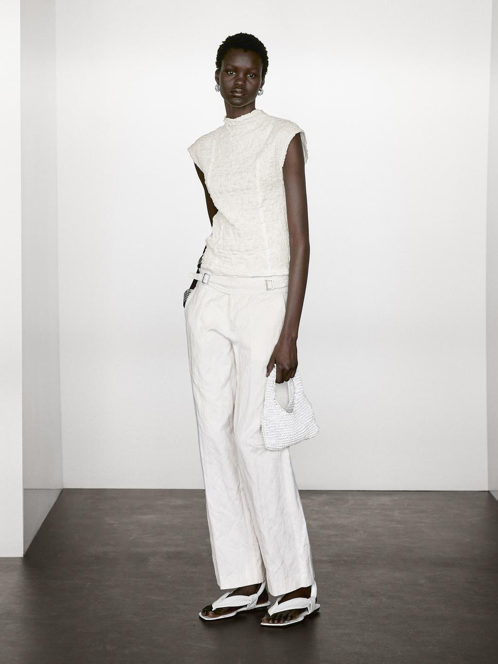 Sleeveless top with gathered detail