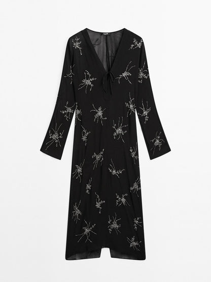 Flowing midi dress with embroidery