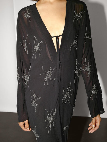 Flowing midi dress with embroidery