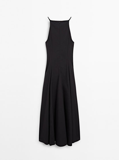 Long halter neck dress with flounce