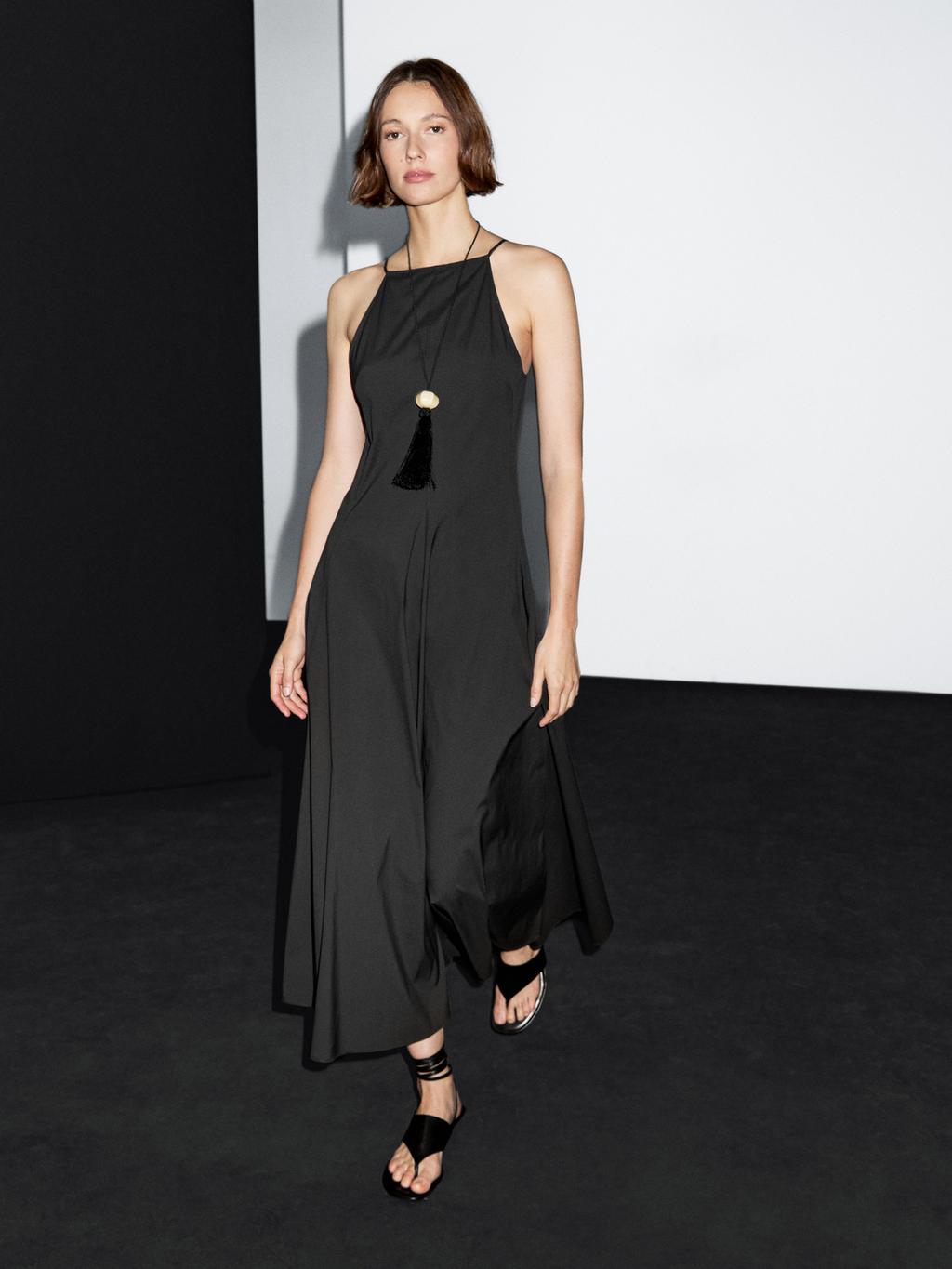 Long halter neck dress with flounce