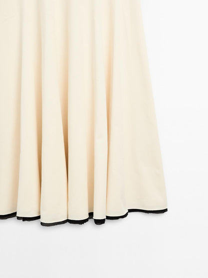 Flounce dress with contrast trims