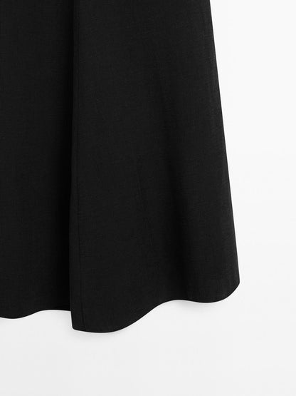 Halter midi dress with low-cut back