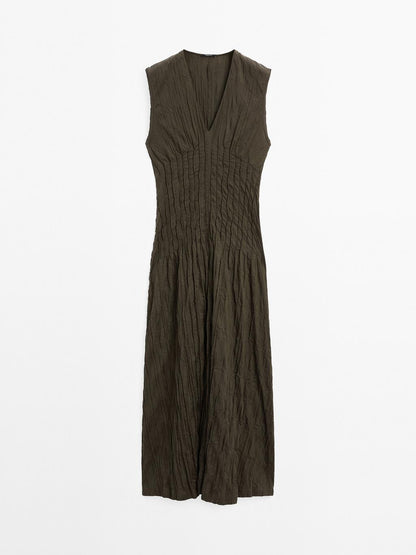 Creased-effect long pleated dress