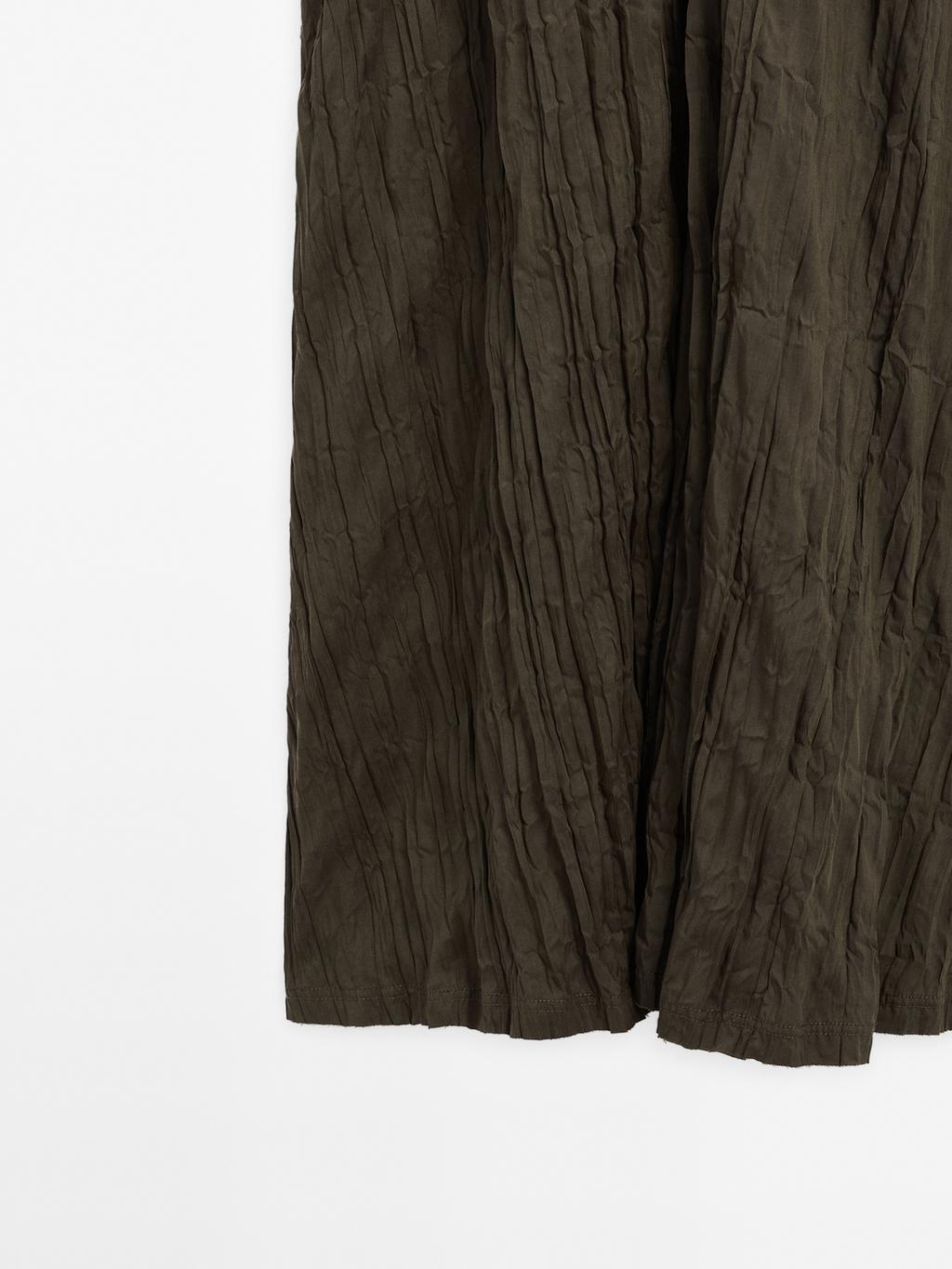 Creased-effect long pleated dress