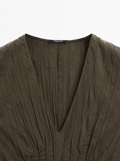 Creased-effect long pleated dress