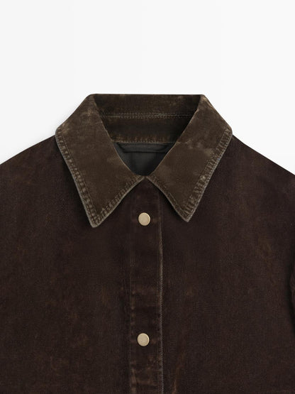 Short denim jacket with pockets and flocked finish