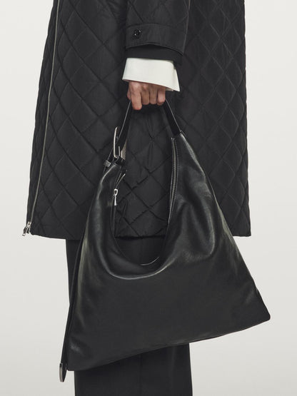 Long water-repellent oversize quilted parka